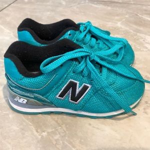 New teal New Balance sneakers